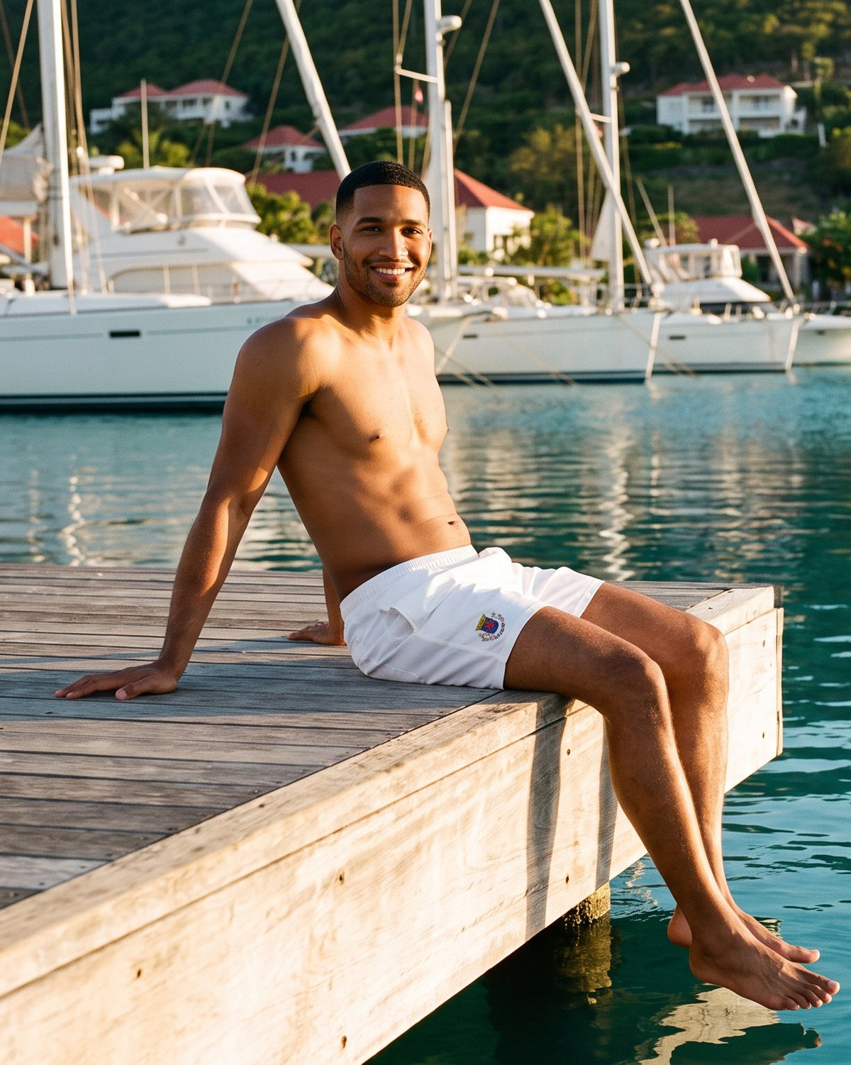 AI-generated scene: fictional model wearing Saint Barthélemy Swim Trunks – White Crest at Gustavia harbour, Saint Barthélemy